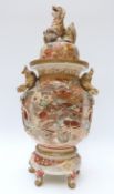 A Japanese Satsuma lidded vase with warrior decoration and Fo dog finial,
