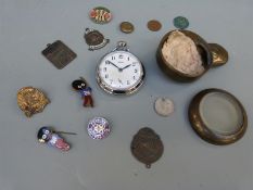 A Smiths pocket watch in a brass miner's type case, Cheltenham Steeplechase badges,