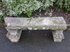 A stone garden bench,