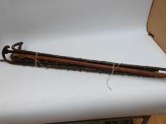 Seven various walking sticks including blackthorn shafted and white metal topped examples