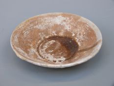 A Chinese blue and white dish, decorated in the central well pattern,