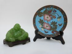 A 19thC cloisonné plate on stand and a hardstone Buddha