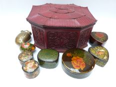 A Chinese red lacquer box with a quantity of Indian lacquer boxes