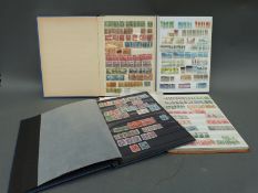 Three stockbooks of Canada stamps and one stockbook of mixed Canada,