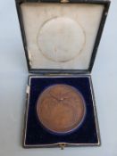 A Victorian bronze pigeon racing medallion dated 1872, awarded to H.W.