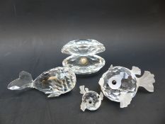 Four Swarovski Crystal animals comprising whale. two fish and a clam, largest 6.