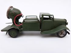 Tri-ang Minic clockwork tinplate Military Search Vehicle with green cab and body,