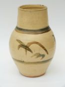 A studio pottery vase with incised mark to base,