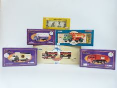 Five Corgi diecast model commercial vehicles comprising three Cadbury lorries,