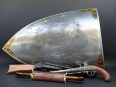 A replica medieval shield with rampant lion decoration, length 73cm, width 45cm,