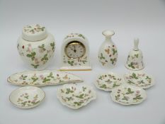 A collection of Wedgwood Wild Strawberry ware including a clock