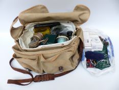 A bag of fisherman's and other sporting equipment including a brass trout fishing reel marked Ogden