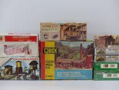 Twelve railway and other plastic model kits including Minicraft 1872