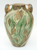 A Japanese pottery vase with figural kingfisher handles,