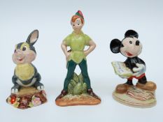 Three Beswick Disney figures comprising Peter Pan, Mickey Mouse and Thumper,