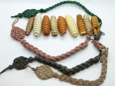 A quantity of lanyards and handles to suit Nazi German daggers