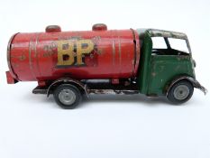 Tri-ang Minic clockwork tinplate BP Petrol Tanker with green cab, red tank, grey hubs,