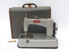 Essex Miniature Machine child's sewing machine in vintage suitcase