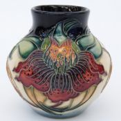 Moorcroft vase in Anna Lily pattern, 8cm tall,