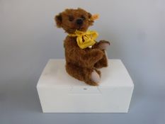 Steiff Original Teddy Bear Jona with chestnut mohair, yellow ribbon, shaved snout and jointed limbs,