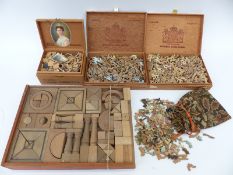 A collection of vintage wooden puzzles and building blocks