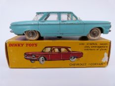 Dinky Toys diecast model Chevrolet Corvair with turquoise body, cream interior,