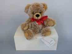 Steiff Original Teddy Bear Bobby with brown tipped mohair, soft body and red ribbon, 30cm tall,