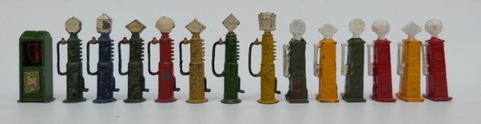 Fourteen Dinky Toys, Britains and similar diecast model petrol,