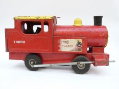 Tri-ang Puff-Puff pressed steel train with red body an yellow roof.