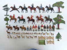 Fifty-one Britains lead model hunting figures and animals comprising eight huntsmen and women,