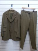 A tweed shooting suit by Kilmaine, with label for The Famous,