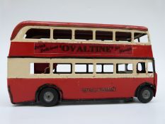 Tri-ang Minic clockwork tinplate London Transport double decker bus with red and cream body,