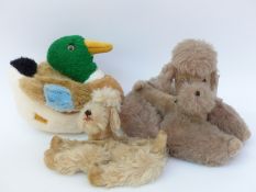 Three various Teddy bears comprising a Merrythought duck and two dogs