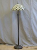 A reproduction Tiffany floor light,