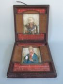 A pair of 1930 French alabaster/ plaster of Paris wall plaques depicting a lady and gentleman at a