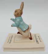 Beswick Beatrix Potter figure Peter on his Book,
