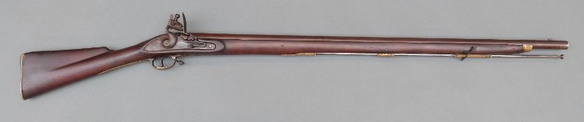 Brown Bess India pattern flintlock hammer action gun with brass trigger guard,