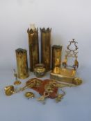 A collection of brass items including trench art shell cases