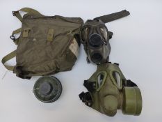 Iraqi Army mark III respirator with pouch together with an earlier example