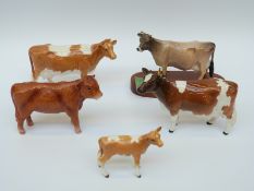 Five Beswick cattle to include Ayrshire, Jersey,