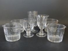 A group of Victorian and Georgian glassware comprising four twin spouted bowls,