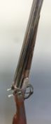 James Purdey 16 bore side by side hammer action shotgun with fine scrolling engraving to the locks,