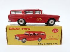 Dinky Toys diecast model Canadian Fire Chief's Car with red body, red roof light and spun hubs 257,