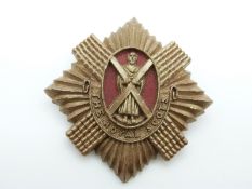 WWII Royal Scots plastic cap badge made by A Stanley and Sons,