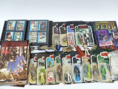 Thirteen Kenner and Palitoy Star Wars action figures, all in original packaging,