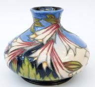 Moorcroft vase of squat form in the Ivory Bells pattern, 10cm tall,