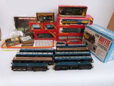 A quantity of mainly Hornby 00 gauge railway rolling stock and accessories including HST, Class 37,