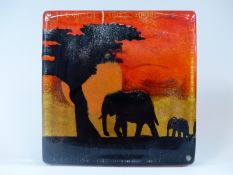 Caithness Glass paperweight depicting elephants,