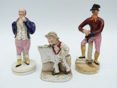 Two Staffordshire figures and a German figure of a newspaper vendor
