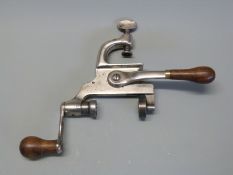 French steel cartridge loading tool with turned wooden handles stamped A R Marque Deposee Armes et